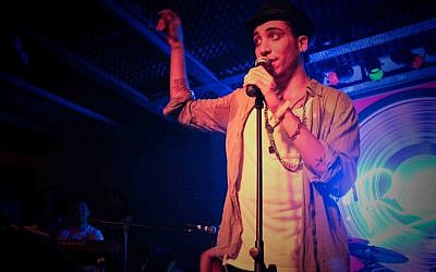 Jewish singer Can Bonomo, shown performing at an Istanbul club in March 2011, finished seventh in the Eurovision song contest as Turkey's representative. (photo credit: Can Bonomo official website/via JTA)