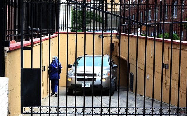 Embassy staff back a van into the underground garage at the Iranian embassy in Ottawa, Friday Sept.7, 2012 (photo credit: AP/The Canadian Press, Fred Chartrand) Embassy staff back a van into the underground garage at the Iranian embassy in Ottawa, Friday Sept.7, 2012 (photo credit: AP/The Canadian Press, Fred Chartrand)
