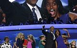 US President Barack Obama and daughter Malia wave to the crowd after the president's speech at the 2012 Democratic National Convention (photo credit: AP/Charles Dharapak)