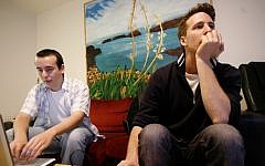 Israeli entrepreneurs work on a new start-up project in Tel Aviv (Photo credit: Miriam Alster/Flash90)