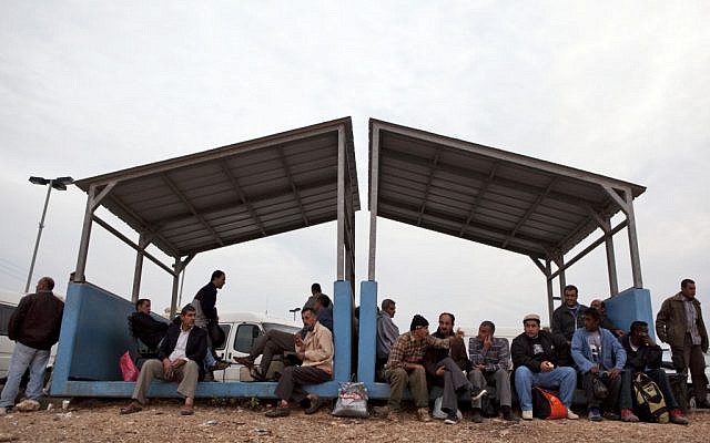Palestinian workers at a checkpoint near Qalqilya in 2009. (Matanya Tausig/Flash90)