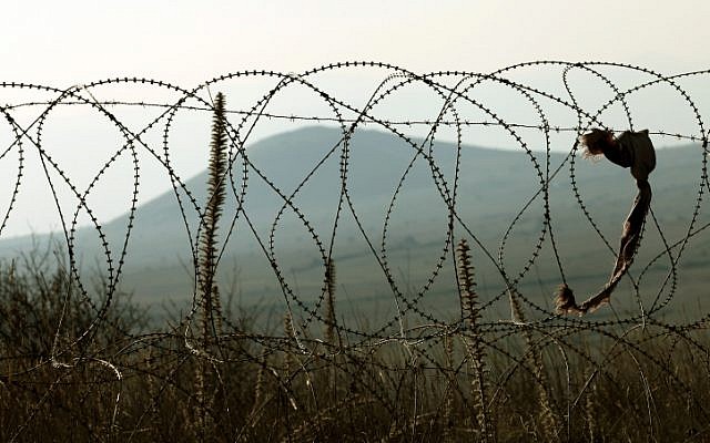 A barbed wire fence on the Syrian border. (photo credit: Moshe Shai/Flash90)