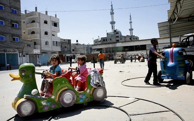 Palestinian children visit an amusement park in the Gaza Strip on August 20, 2012. (photo credit: Abed Rahim Khatib/Flash 90)