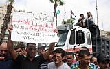 Palestinians demonstrate against the government in Ramallah, September 9 (photo credit: Issam Rimawi/ Flash90)