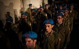 Soldiers standing at attention during the funeral of Netanel Yahalomi.  Yahalomi was killed Friday during a firefight with terrorists along the Egyptian border (photo credit: Yonatan Sindel/Flash90)