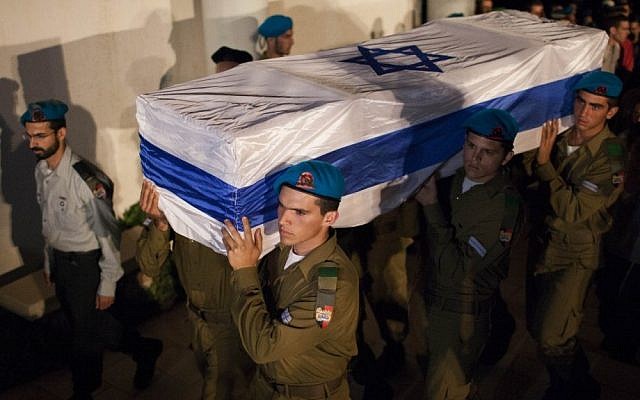 Israeli soldiers carry the coffin of Netanel Yahalomi during his funeral in the Israeli city of Modiin, early Sunday, September 23, 2012. Yahalomi was killed Friday in a shootout between Islamist terrorists and IDF troops along Israel's southern border with Egypt. (photo credit: Yonatan Sindel/Flash90 Israeli soldiers carry the coffin of Netanel Yahalomi during his funeral in the Israeli city of Modiin, early Sunday, September 23, 2012. Yahalomi was killed Friday in a shootout between Islamist terrorists and IDF troops along Israel's southern border with Egypt. (photo credit: Yonatan Sindel/Flash90