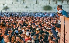 Illustrative: The night before Yom Kippur at the Western Wall, 2012. (photo credit: Oren Nahshon/Flash90)