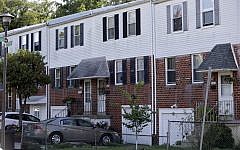 The home of Johann 'Hans' Breyer, center, is seen in Philadelphia (photo credit: AP/Matt Rourke)