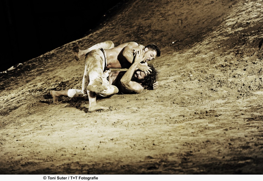 Neuenschwander, as God, wrestles with Jacob in "Genesis" at the Schauspielhaus (Courtesy of the Schauspielhaus, Zurich)