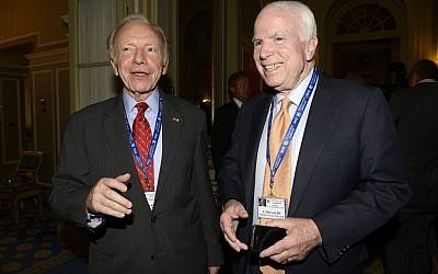 US Senators John McCain, right, and Joseph Lieberman during a meeting on World Economy in Cernobbio, Italy, Friday, Sept. 7 (photo credit: AP/Giuseppe Aresu)