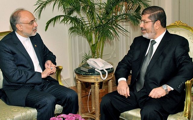 Egyptian President Mohammed Morsi, right, meets with Iranian Foreign Minister Ali Akbar Salehi at the Presidential Palace in Cairo, Egypt, Tuesday, Sept. 18, 2012. (photo credit: AP/Egyptian Presidency)