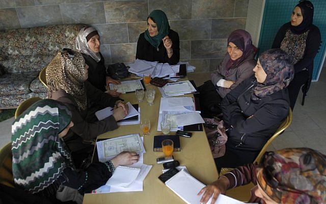 Women in the "By Participating, We Can" group meeting last week. (photo credit: AP/Nasser Shiyoukhi) Women in the "By Participating, We Can" group meeting last week. (photo credit: AP/Nasser Shiyoukhi)