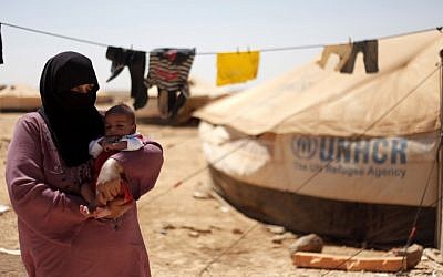 Syrian refugees at Zaatari Refugee Camp in Mafraq, Jordan, in early September (photo credit: AP/Mohammad Hannon)