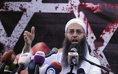Sunni hardline preacher Sheikh Ahmad Assir speaks during a protest against an anti-Islam movie, in Beirut, Lebanon, Friday. (AP Photo/Ahmad Omar)
