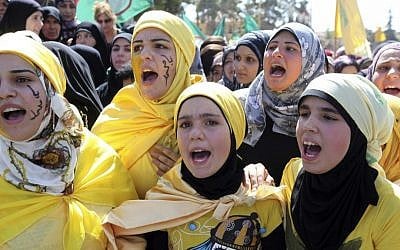 Lebanese girls chant slogans during a protest about a film ridiculing Islam's Prophet Muhammad in Lebanon’s eastern city of Baalbek, Lebanon, Friday, Sept. 21, 2012. (AP Photo/Bilal Hussein)