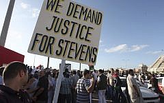 Libyans protest against Islamic militias in Benghazi, a week after the attack on the US Embassy that killed Ambassador Chris Stevens and three others in September 2012. (photo credit: AP /Mohammad Hannon)