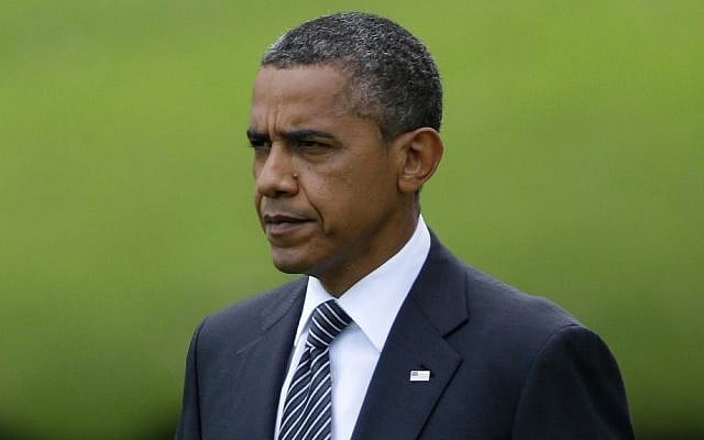 President Barack Obama walks on the South Lawn of the White House in Washington, Friday, Sept. 14, 2012, heading to Andrews Air Force Base, Md. to attend a ceremony marking the return to the United States of the remains of the four Americans killed this week in Benghazi, Libya (photo credit: AP/Pablo Martinez Monsivais)