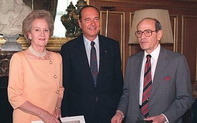 In this May 26, 1992 file photo, Paris Mayor Jacques Chirac, poses for a photo while flanked by Washington Post Company President Katharine Graham, left, and New York Times Company President Arthur Ochs Sulzberger, after awarding them the Paris City Medal, in Paris. (file photos; photo credit: AP)