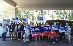 Republican Jewish Coalition volunteers in Cleveland preparing to protest Obama at the Browns-Eagles NFL game, September 9, 2012. (photo credit: Courtesy RJC/JTA)
