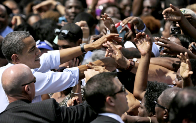 President Barack Obama greets supporters after speaking at a campaign event at Norfolk State University, on Tuesday, in Norfolk, Va. (photo credit: AP Photo/Pablo Martinez Monsivais)