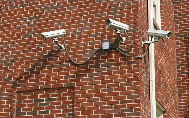 Illustrative photo of three security cameras attached to a building. (CC BY-SA 3.0, by Ildar Sagdejev (Specious), Wikimedia Commons)