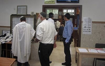 The foyer of the Shtiblach, a round-the-clock synagogue in southern Jerusalem. (photo credit: Ben Sales/JTA)