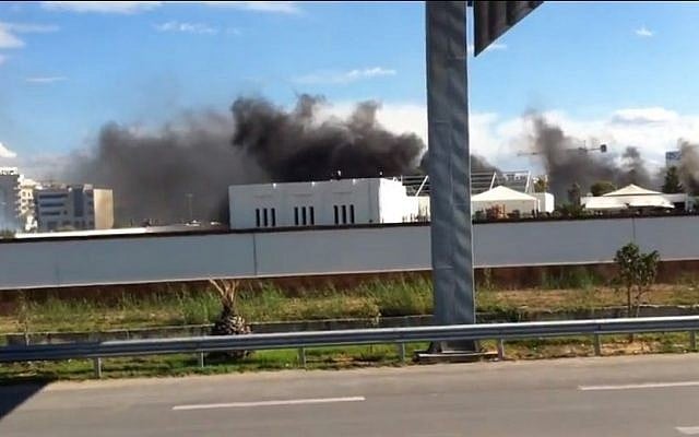 Smoke rising over the US embassy compound in Tunis, Tunisia, on September 14 (photo credit: Youtube screen capture) Smoke rising over the US embassy compound in Tunis, Tunisia, on September 14 (photo credit: Youtube screen capture)