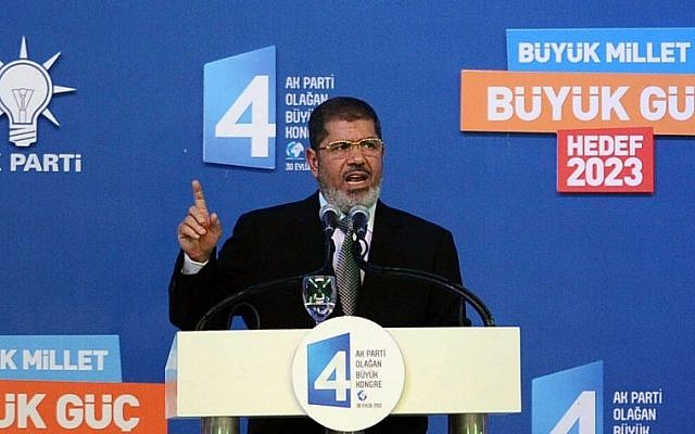 Egyptian President Mohammed Morsi addresses the congress of Turkey's ruling Justice and Development Party in Ankara, Turkey, Sunday, Sept. 30 (photo credit: AP)