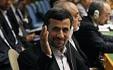 Iranian President Mahmoud Ahmadinejad gestures as he arrives at his seat before addressing the UN General Assembly on Wednesday (photo credit: AP/Jason DeCrow)
