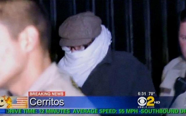 In this image from video provided by CBS2-KCAL9, Nakoula Basseley Nakoula is escorted from his home by police earlier this month (Screenshot: AP/CBS2-KCAL9) In this image from video provided by CBS2-KCAL9, Nakoula Basseley Nakoula is escorted from his home by police earlier this month (Screenshot: AP/CBS2-KCAL9)
