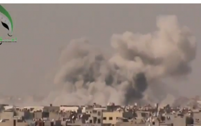 Smoke rising from a bombing in Damascus on September 19. (photo credit: Image capture from YouTube video uploaded by Freeeeelibyan)