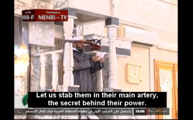 A Benghazi preacher calling for a violent boycott of the West because of its irreverence towards the Prophet Mohammed. (photo credit: Image capture from MEMRITV video)