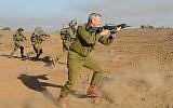 Chief of Staff Lt. Gen. Benny Gantz in action during a live fire exercise for battalion commanders on the Golan Heights, September 4, 2012. (photo credit: Shay Wagner/IDF/Flash90)