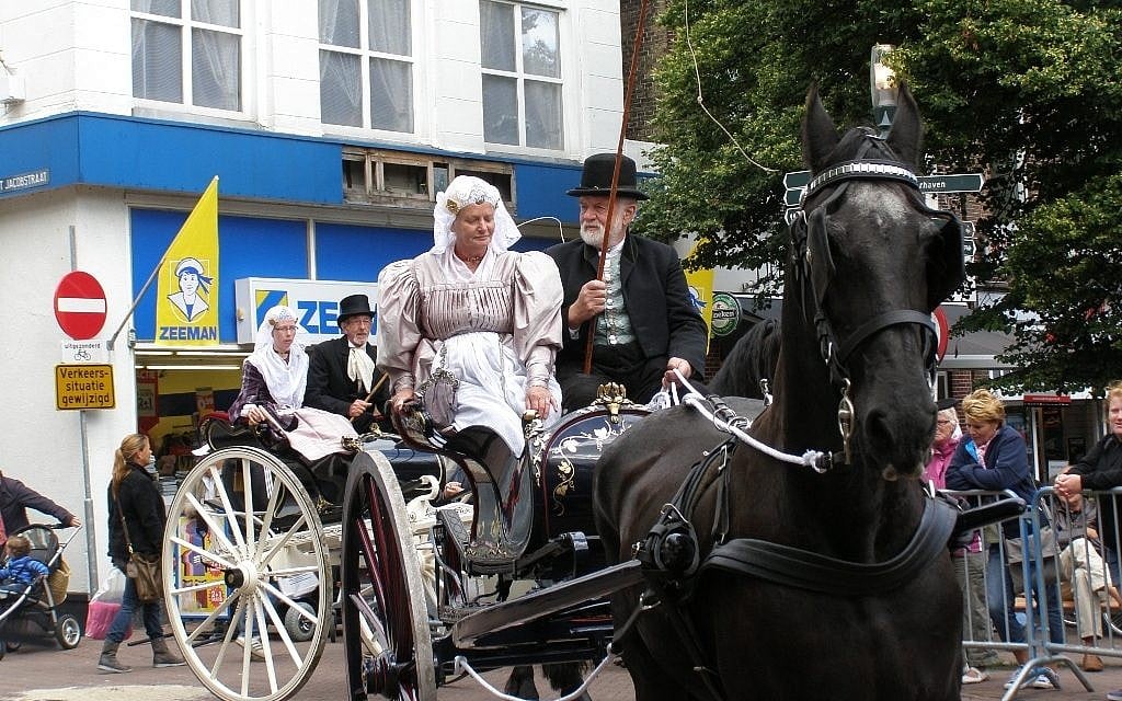Frisians in traditional garb celebrating Fisherman's Day in Harlingen, Aug. 31, 2012. (photo credit: Cnaan Liphshiz/JTA)