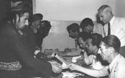 Registration of Jewish immigrants from Iraq at Lod Airport, May 1951 (photo credit: GPO)