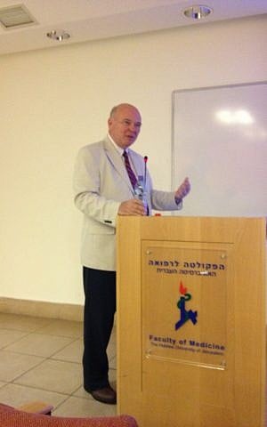 Genocide Watch founder and director Greg Stanton delivering a lecture at the Hebrew University's medical school (Photo credit: Mitch Ginsburg/ Times of Israel) Genocide Watch founder and director Greg Stanton delivering a lecture at the Hebrew University's medical school (Photo credit: Mitch Ginsburg/ Times of Israel)