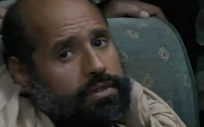Saif Gaddafi hours after he was captured by Libyan rebel forces in November 2011 (photo credit: Youtube screen capture)