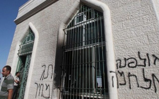 Suspected price tag vandalism at a mosque near Ramallah in the West Bank in June (photo credit: Yossi Zamir/Flash90)