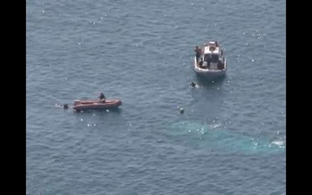 Rescuers searching for the survivors off the Turkish coast. (Screenshot via Youtube/Today's Zaman)