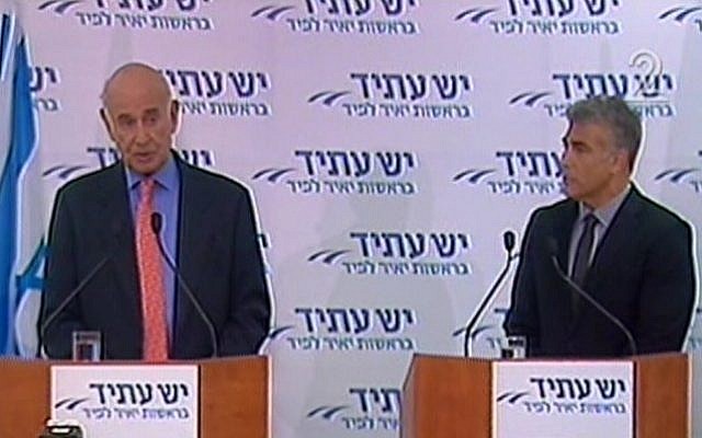 Yaakov Peri (left) and Yair Lapid at a Yesh Atid party press conference on Tuesday. (photo credit: image capture from Channel 2) Yaakov Peri (left) and Yair Lapid at a Yesh Atid party press conference on Tuesday. (photo credit: image capture from Channel 2)