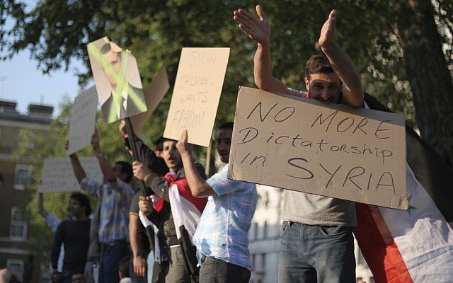 An anti-Assad protest in London in 2011. (photo credit: CC BY-SA  hood.jonathan, Flickr)