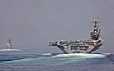 Illustrative: The guided-missile cruiser USS Cape St. George and the aircraft carrier USS Abraham Lincoln transit the Strait of Hormuz. (CC-BY SA 3.0/Official US Navy Imagery)