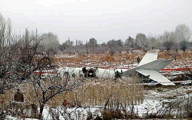 An Iranian military passenger jet which crashed near Tehran in 2009. A newly leaked US report described air defense mishaps in the country in 2007 and 2008 (photo credit: AP)