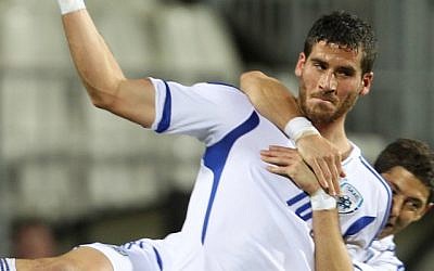 Israel's Tomer Hemed (foreground) and fellow team member Maor Melikson celebrate after Hemed scored a goal during their World Cup Group F qualifying soccer match at the Josy Barthel stadium in Luxembourg, Friday, October 12 (photo credit: AP/Yves Logghe)