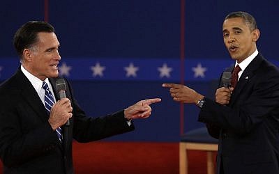 What led to such animosity? Obama and Romney face off on Tuesday night (photo credit: AP Photo/Charlie Neibergall)