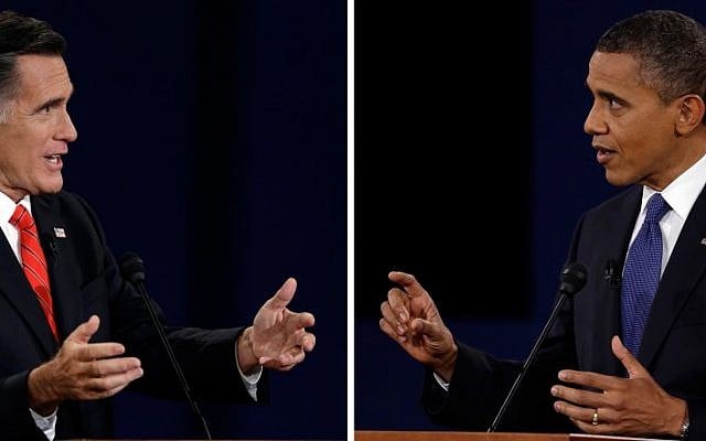 President Barack Obama, right, and Republican presidential nominee Mitt Romney speak during the first presidential debate at the University of Denver, Wednesday, Oct. 3, 2012, in Denver. (photo credit: Charlie Neibergall/AP)