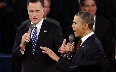 US President Barack Obama and Republican presidential candidate and former Massachusetts Gov. Mitt Romney speak during the second presidential debate at Hofstra University in Hempstead, N.Y., Tuesday, Oct. 16, 2012. (photo credit: Charles Dharapak/AP)