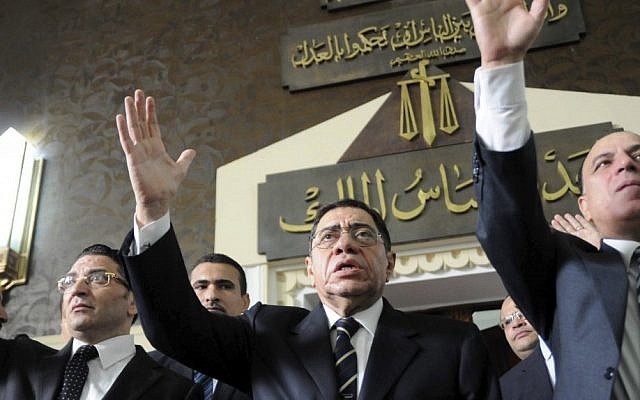 Egyptian Prosecutor General Abdel-Meguid Mahmoud addresses hundreds of supporters, judges, lawyers and media, not shown, in a downtown courthouse defying a presidential decision to remove him from his post, saying this infringes on the judiciary's independence, in Cairo. (photo credit: AP)