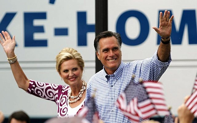 Republican presidential candidate and former Massachusetts governor Mitt Romney with his wife Ann at a campaign rally in Florida on Sunday (photo credit: AP/Lynne Sladky)