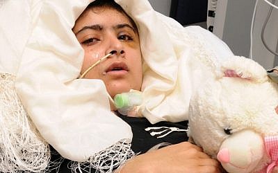 15-year old Pakistani shooting victim Malala Yousufzai, who is recovering in Queen Elizabeth Hospital in Birmingham, England, after being attacked and shot in the head by Taliban gunmen in Pakistan for advocating education for girls. Malala was shot and critically wounded on Oct. 9 as she headed home from school in the northwest Swat Valley, Pakistan. (photo credit: AP Photo / University Hospitals Birmingham NHS Foundation Trust)